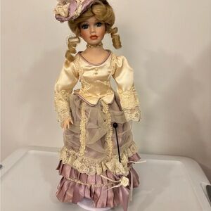 Charming Porcelain Doll with Cream and light Purple Dress